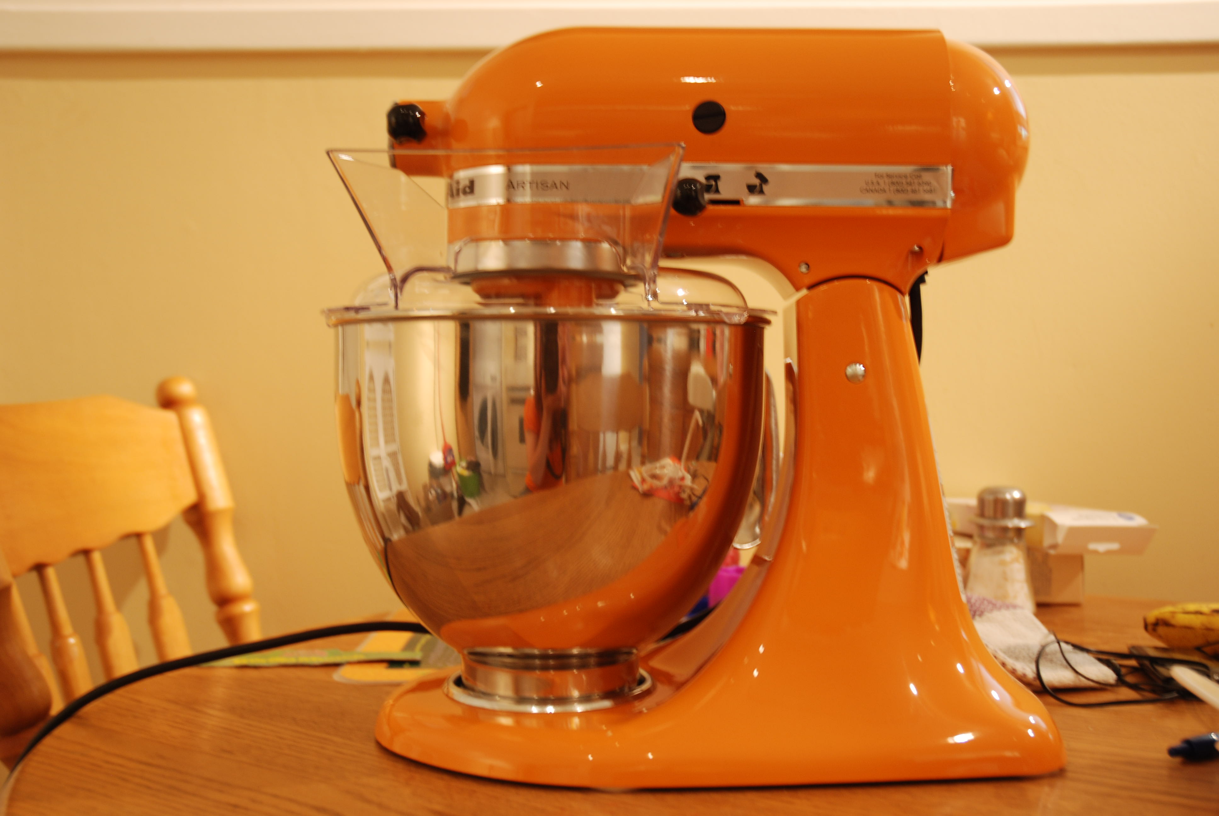 KitchenAid Unveils Taylor Swift-Inspired Tangerine Twinkle Stand Mixer
