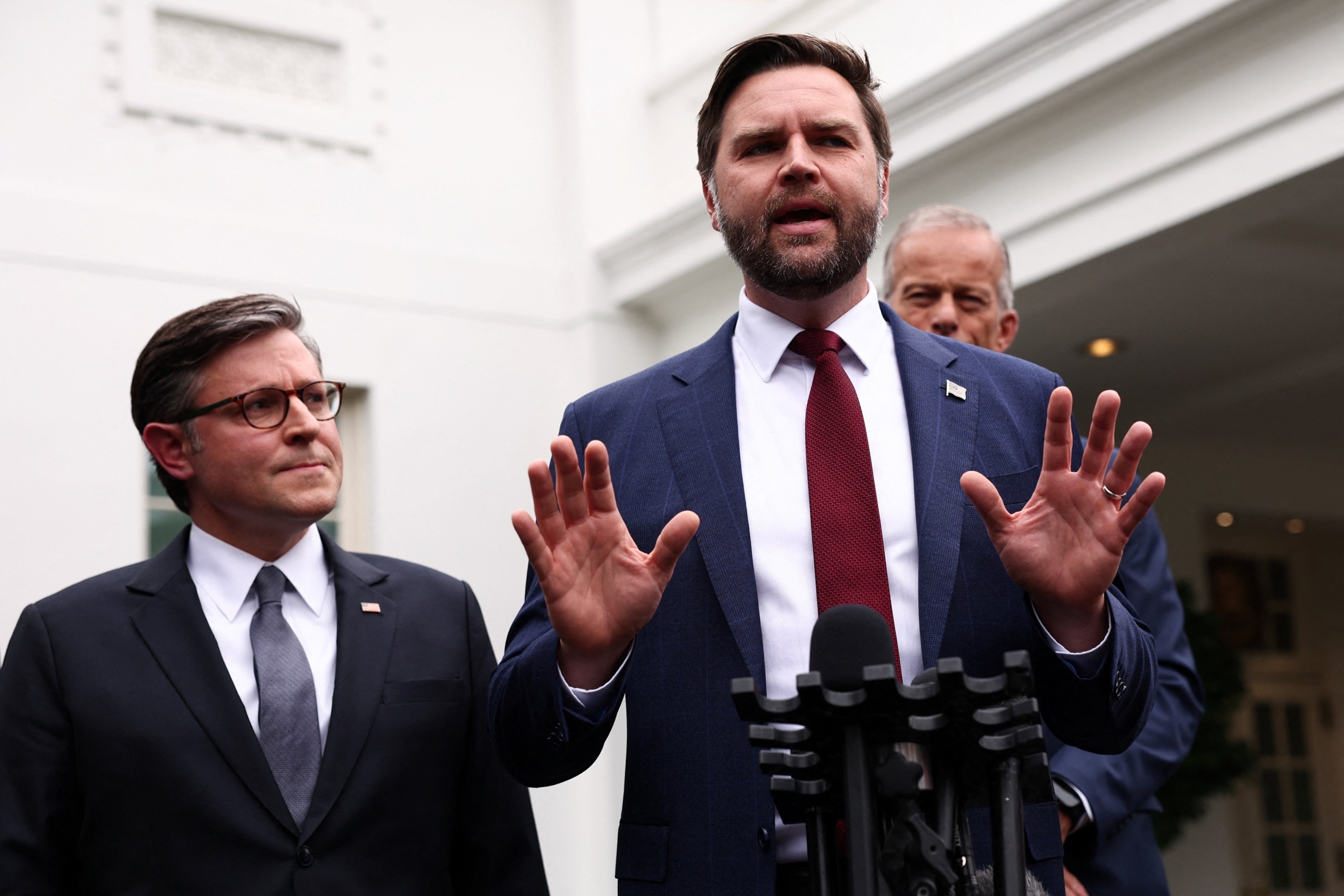 Kevin Lamarque/Reuters - PHOTO: Congressional leaders and President JD Vance address members of the media outside the West Wing at the White House in Washington, Monday, Sept. 29, 2025, in Washington.