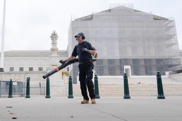Mariam Zuhaib/AP - PHOTO: A Capitol service worker cleans outside of the Supreme Court, Thursday, Sept. 25, 2025, in Washington.