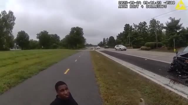 Moment Driver Deliberately Crashes Into Police Car Conducting Traffic