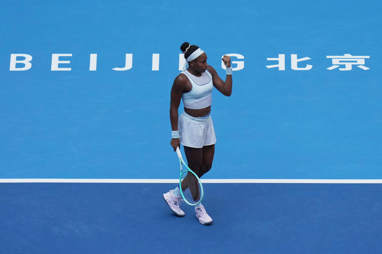 Coco Gauff, of the United States reacts after scoring a point against Eva Lys, of Germany during the women's singles quarterfinals match of the China Open tennis tournament, at the National Tennis Center, in Beijing, Thursday, Oct. 2, 2025. (AP Photo/Andy Wong)