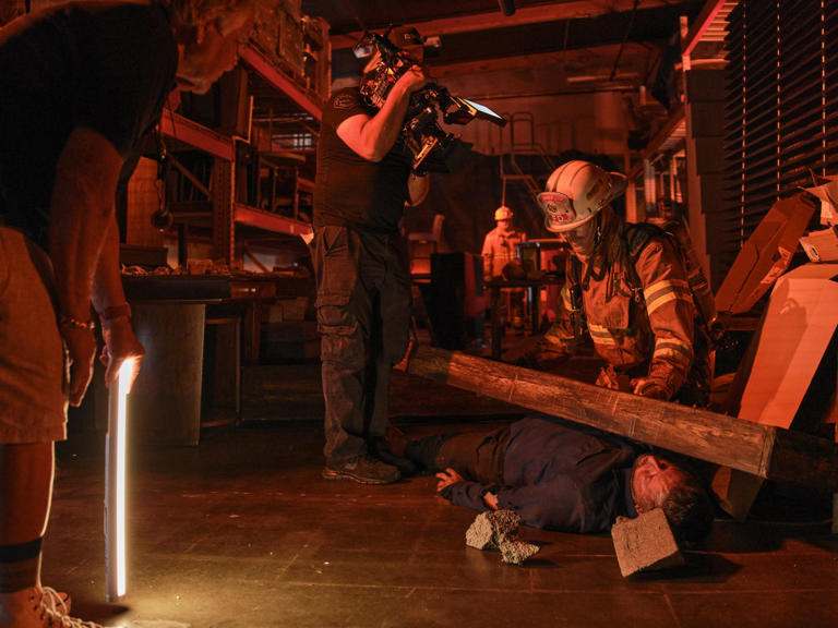 A camera operator films a scene for &lsquo;The Last Firefighter,&rsquo; a rare movie being shot in Los Angeles.