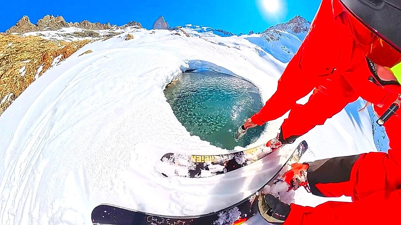 Skier accidentally falls into frozen spring while grabbing a drink