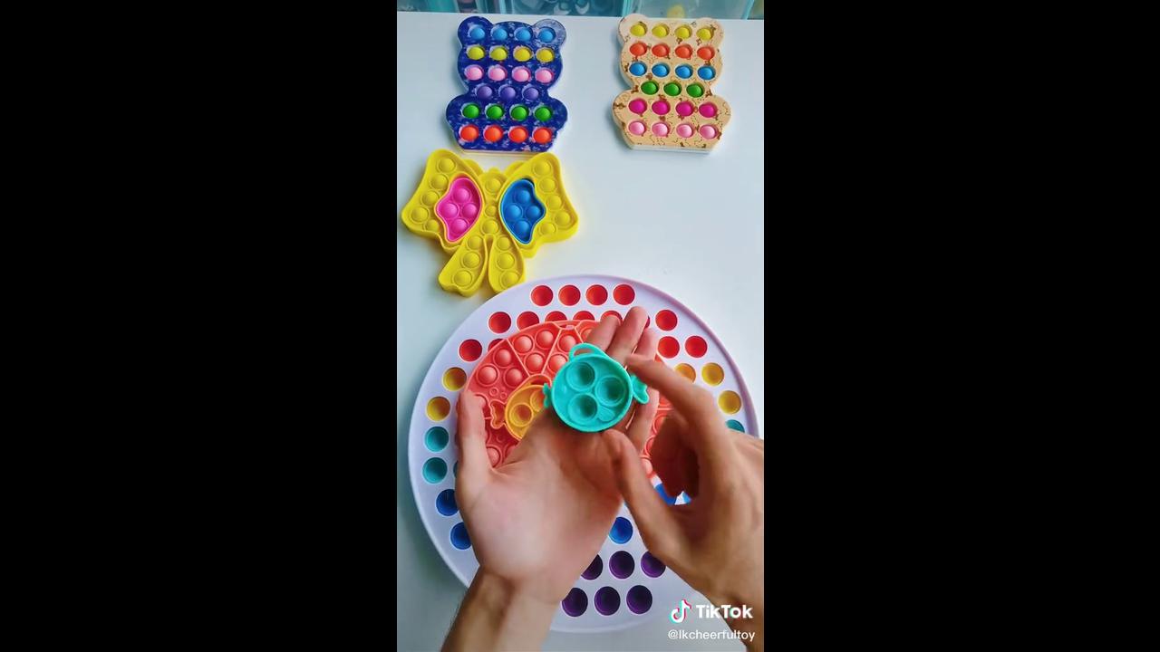 Popping Pop It With Colorful Buttons