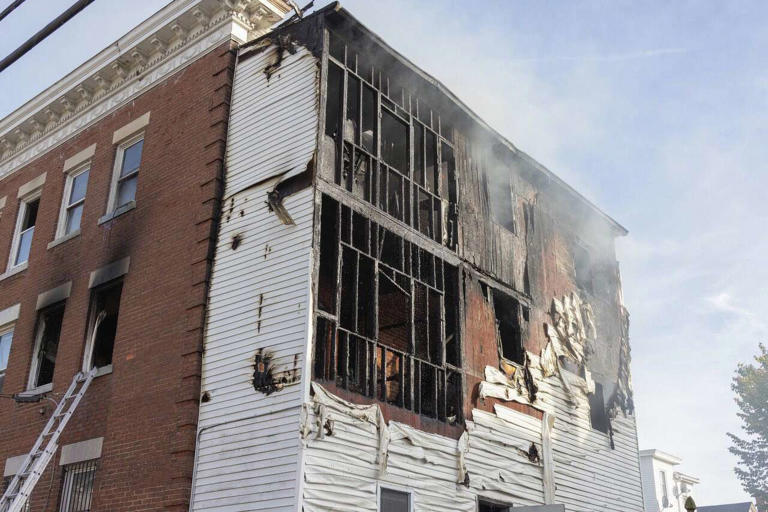 Dog killed, 15 people displaced after apartment fire in CT city ...