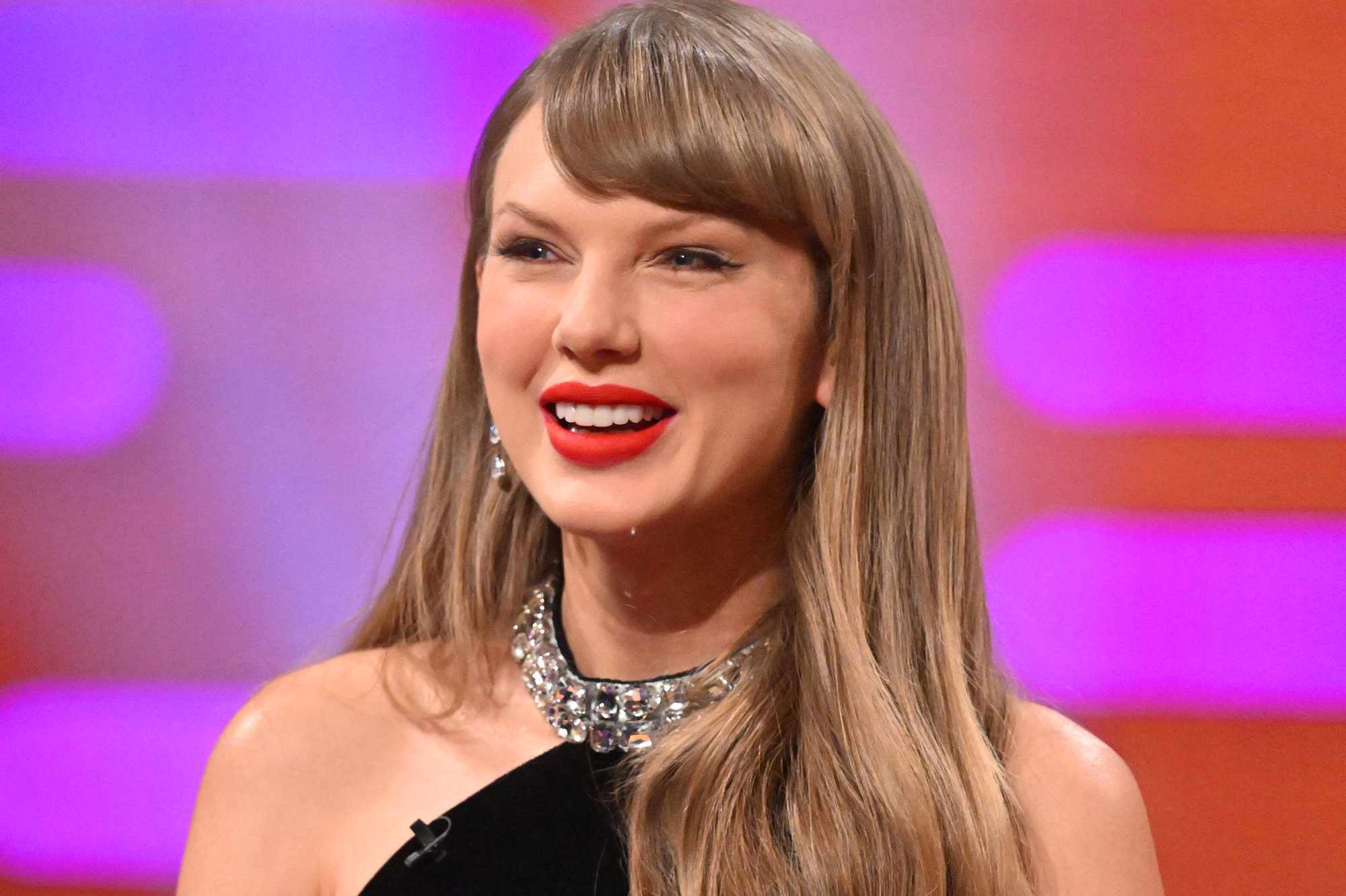 Taylor Swift Dazzles in $1,875 Velvet Mini Dress with a Sparkling Reference  to Her Engagement Ring