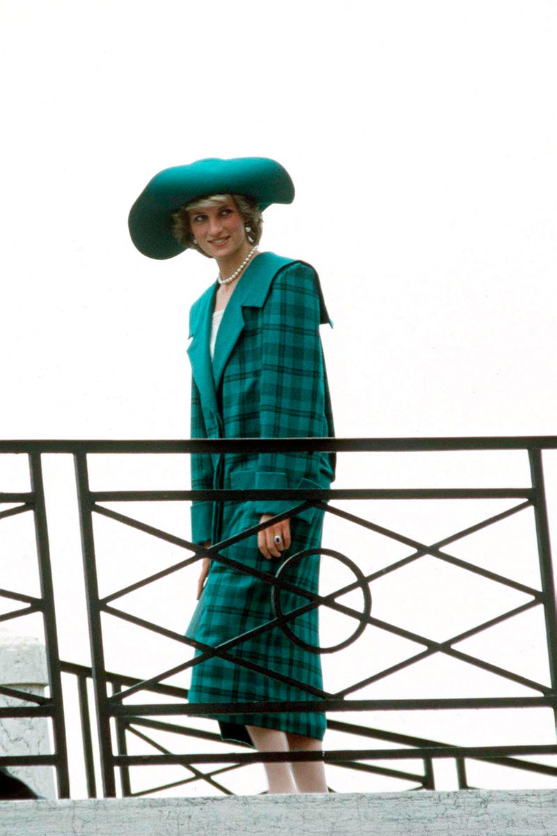 princess diana plaid dress September 5, 1981, then Prince Charles, Prince of Wales and Diana, Princess  of Wales, wearing a tartan dress designed by Caroline Charles and a black  Tam o' shanter style hat, attend the