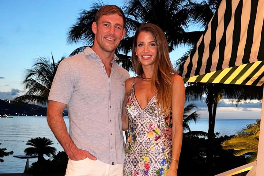 Naomie Olindo and, boyfriend, Billy Haire smiling and posing together.