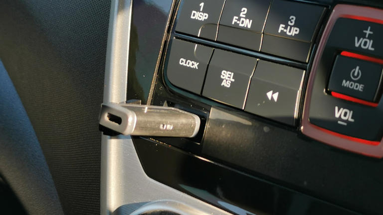 An USB disk plugged into a car USB port