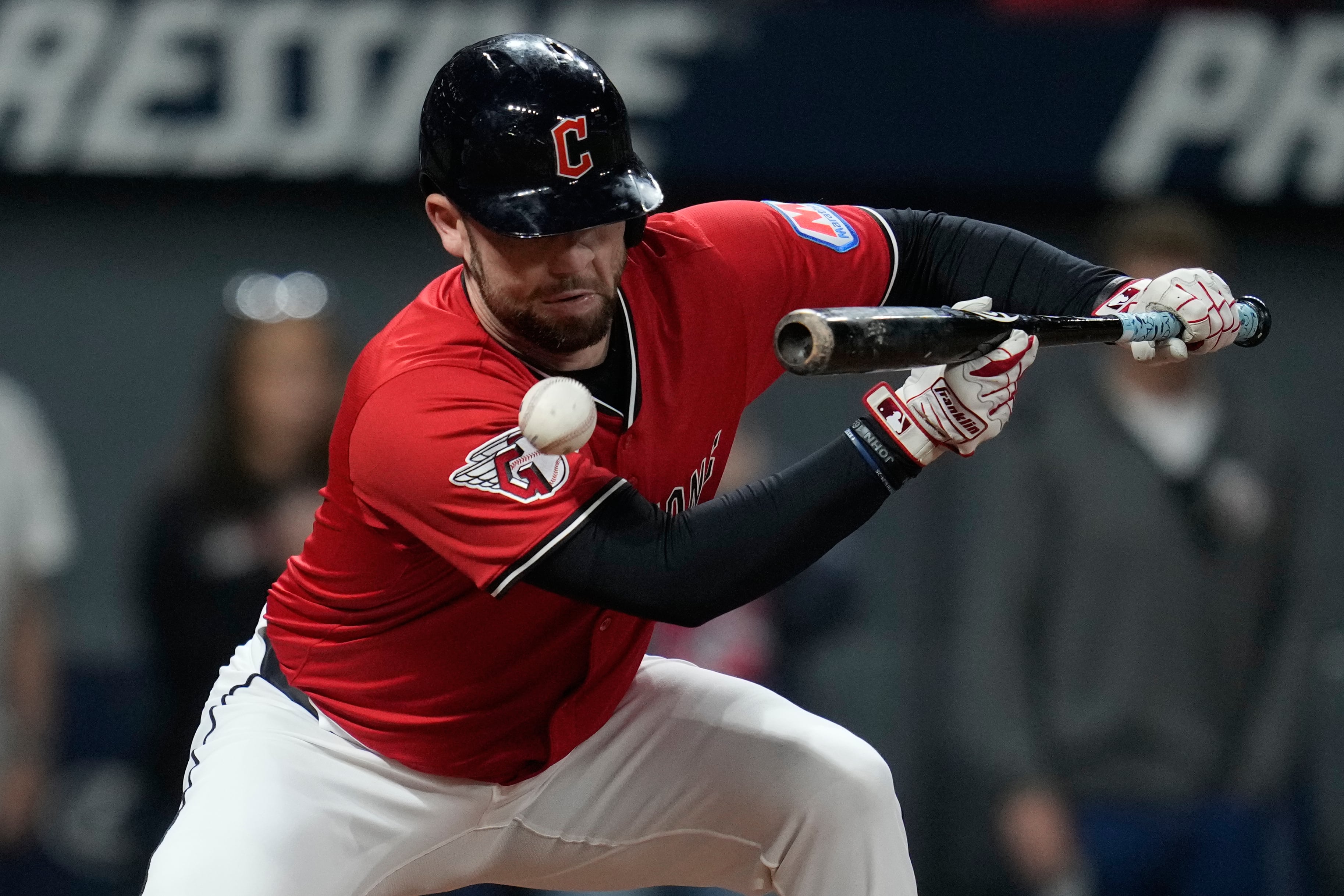 Cleveland Guardian hitter carted off after foul ball hits him in face