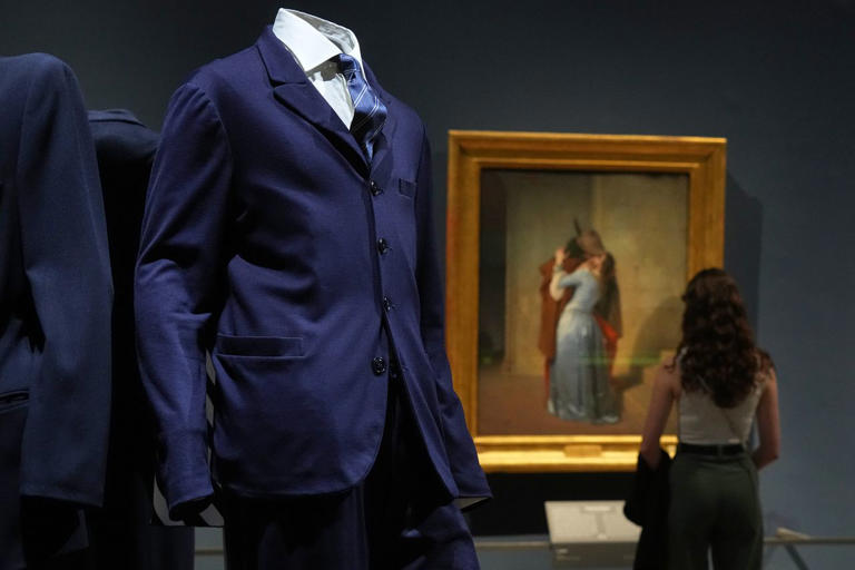 Giorgio Armani creations interplay with Italian masterpieces