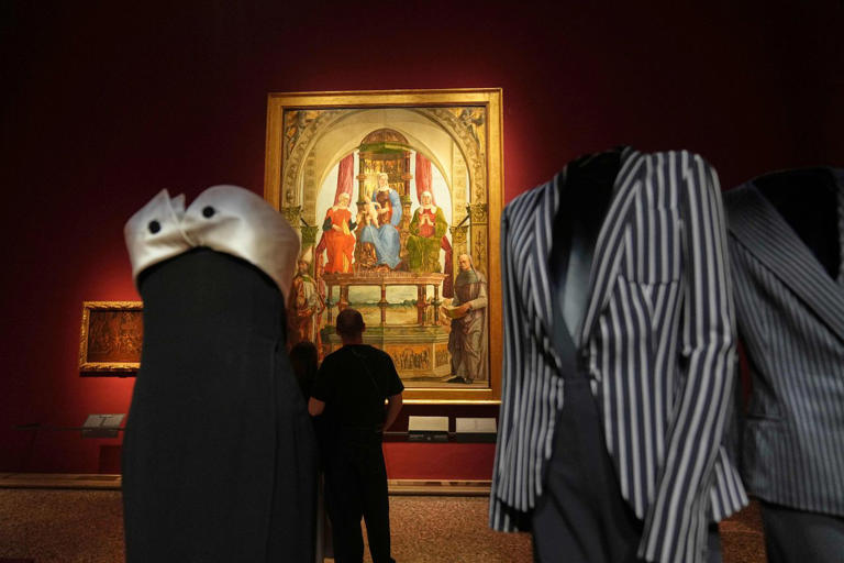 Giorgio Armani creations interplay with Italian masterpieces