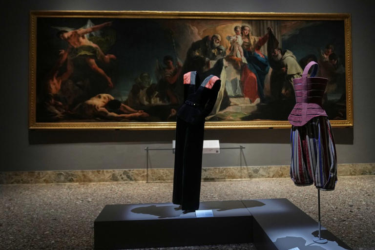 Giorgio Armani creations interplay with Italian masterpieces