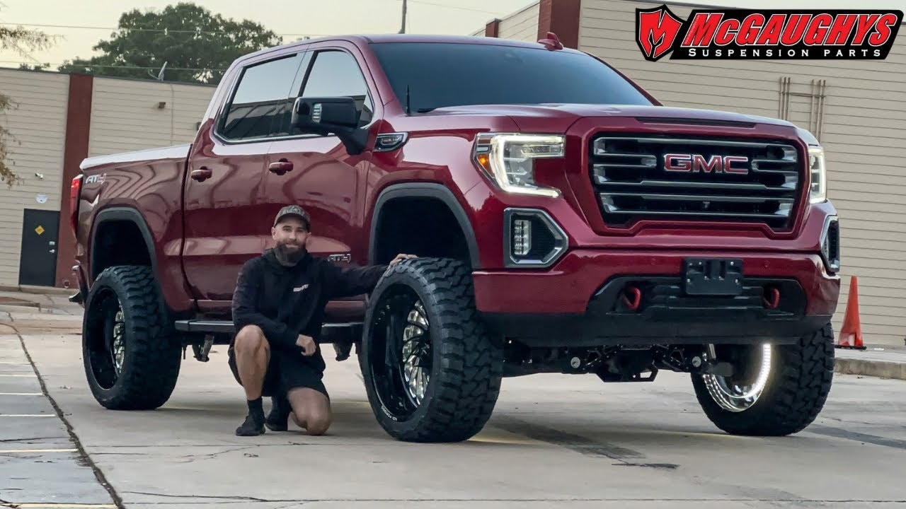 The Perfect Stance: GMC AT4 Gets Aggressive with 7 Lift and 24x14 KG1 ...