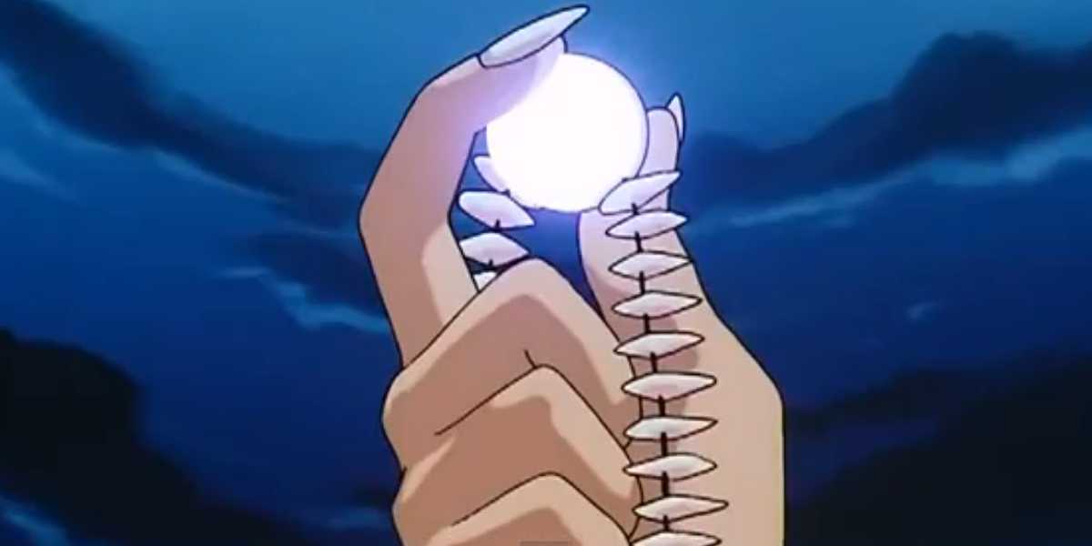 Inuyasha holding the Shikon jewel in Inuyasha