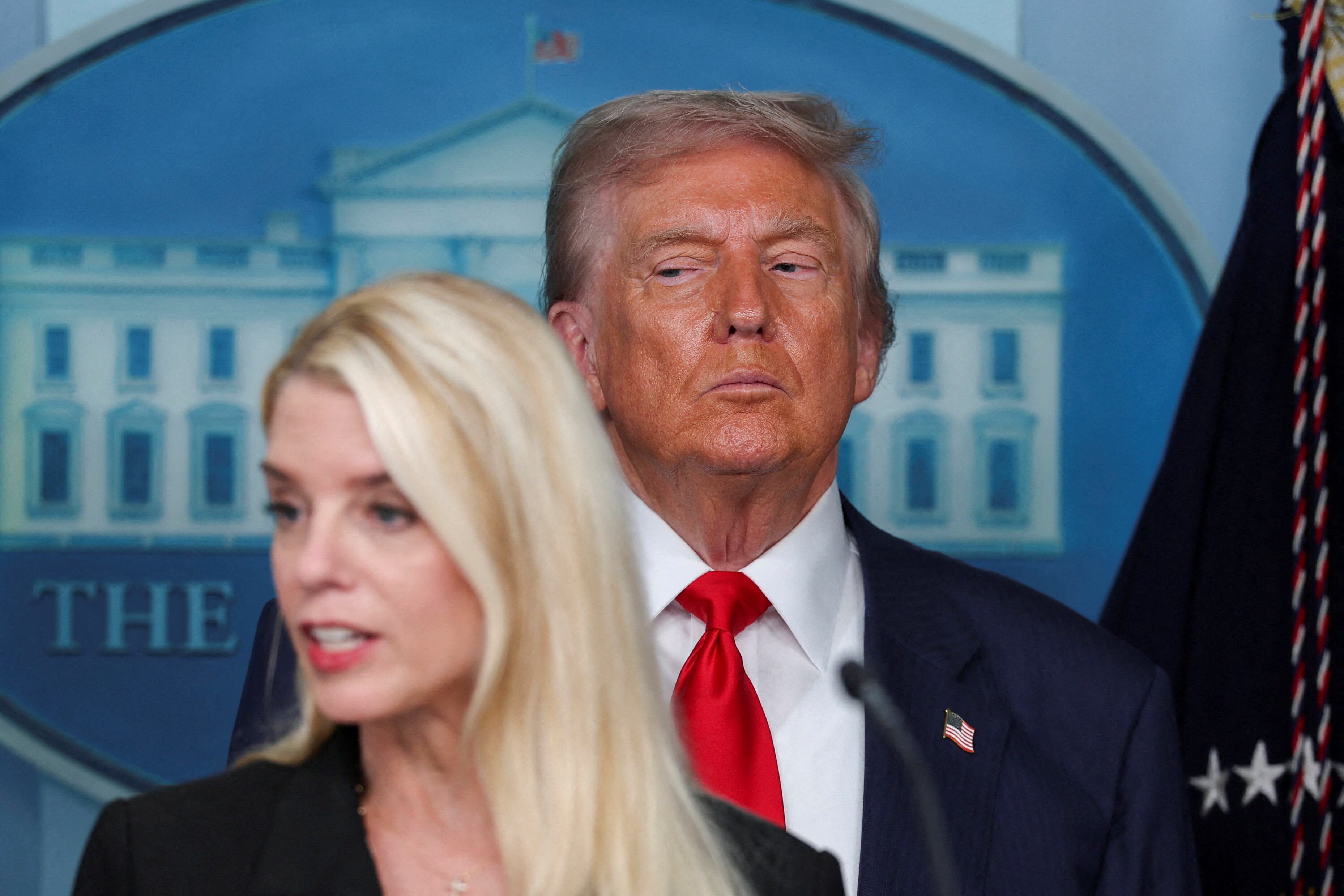 President Trump stands by Attorney General Pam Bondi despite calls for her ousting. / Jonathan Ernst / Reuters