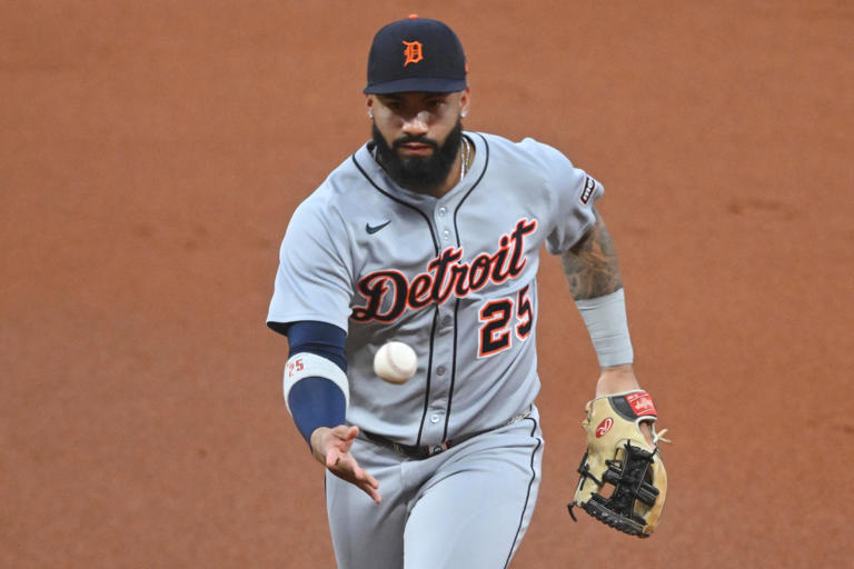 Detroit Tigers second baseman Gleyber Torres (25) tosses the ball to first base in the second inning against the Cleveland Guardians at Progressive Field in Cleveland on Thursday, Sept. 25, 2025.