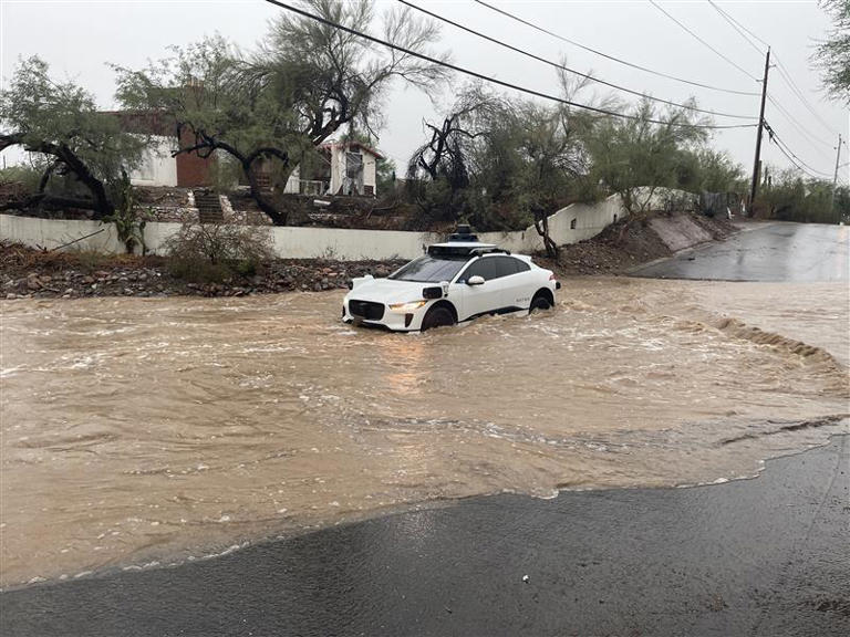 Waymo standing water - Waymo restores service across metro Phoenix after flash flooding