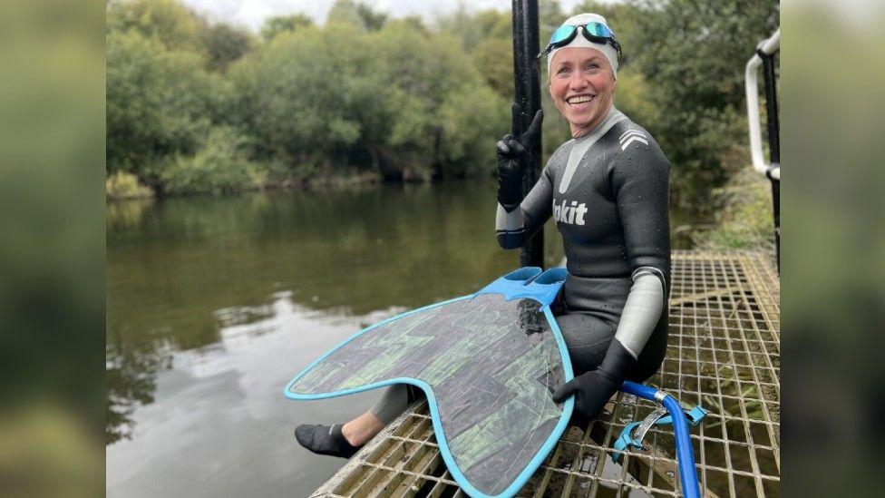Water campaigner attempts record swim with monofin