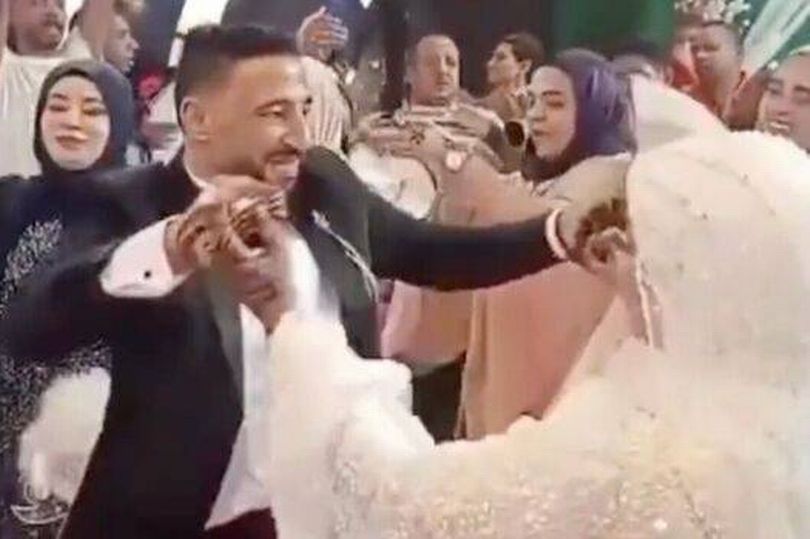Wedding guests scream in horror as groom suddenly dies while dancing