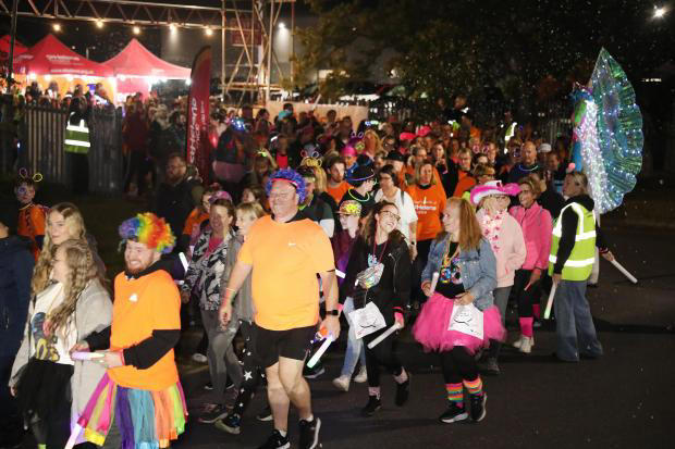 Thousands of pounds raised as hundreds take part in annual midnight ...