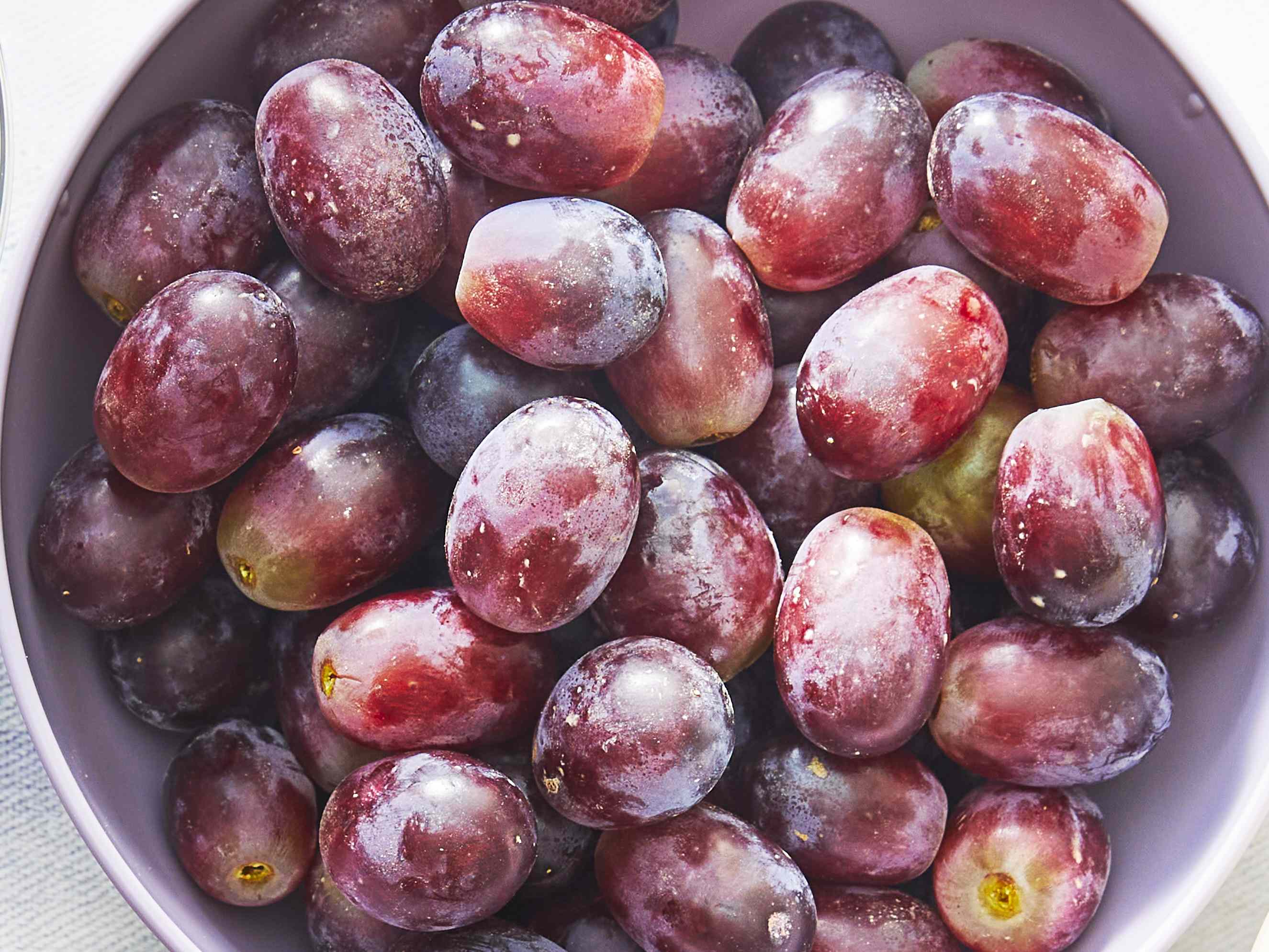 The Surprising Reason Grapes Always Look A Little Dusty