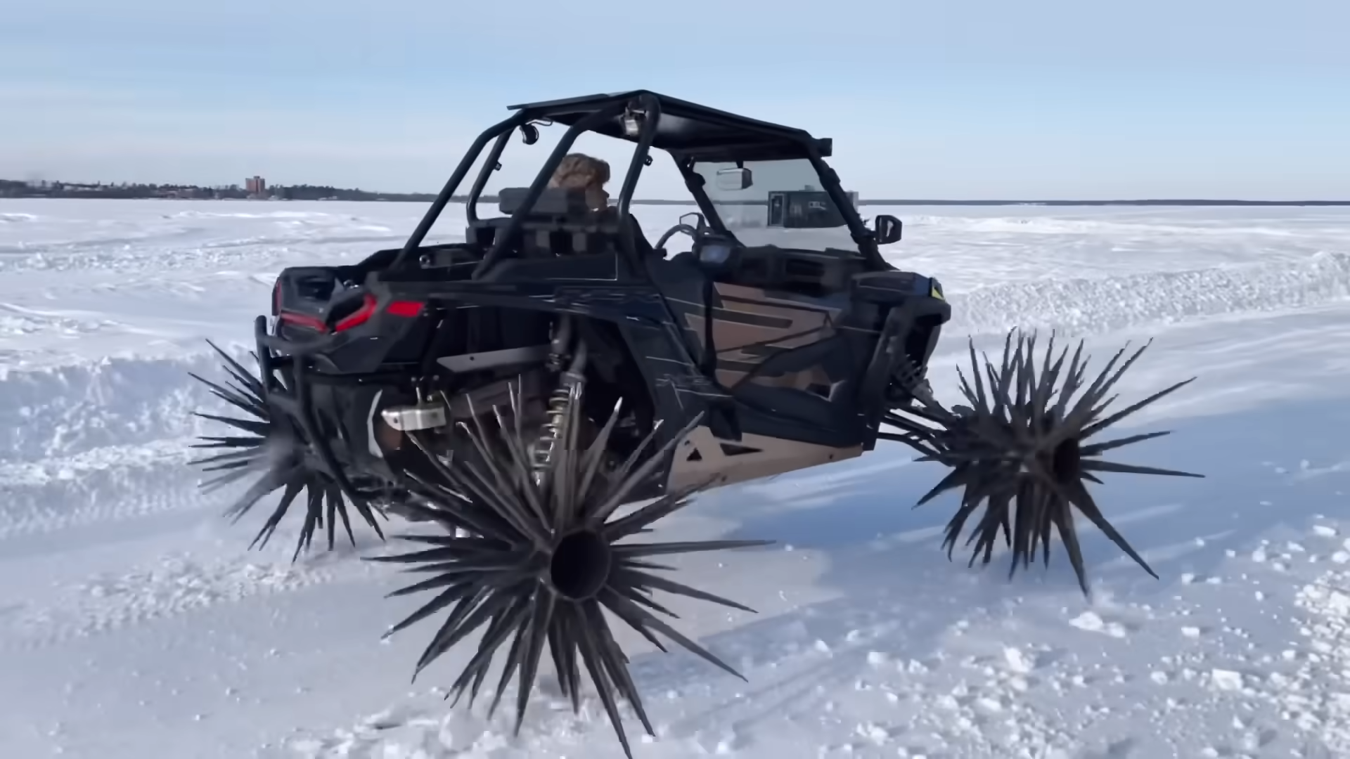 RZR With Reaper Wheels Tears Into a Frozen Lake