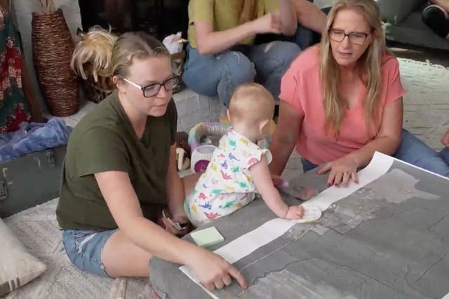 TLC Maddie showing Christine the layout of the farm.