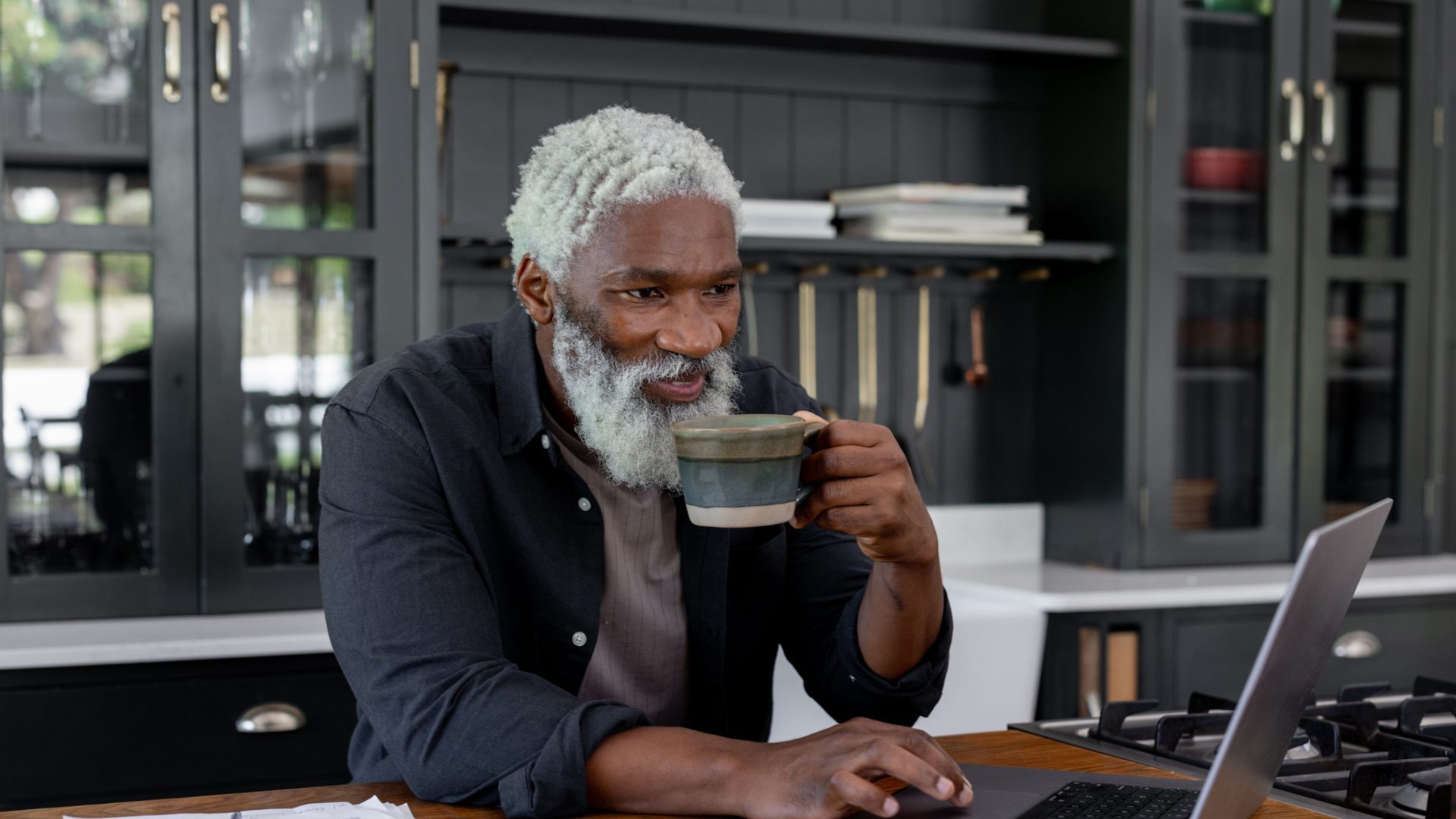 Click, Buy, Repeat: Senior Man Enjoying the Ease of Online Shopping