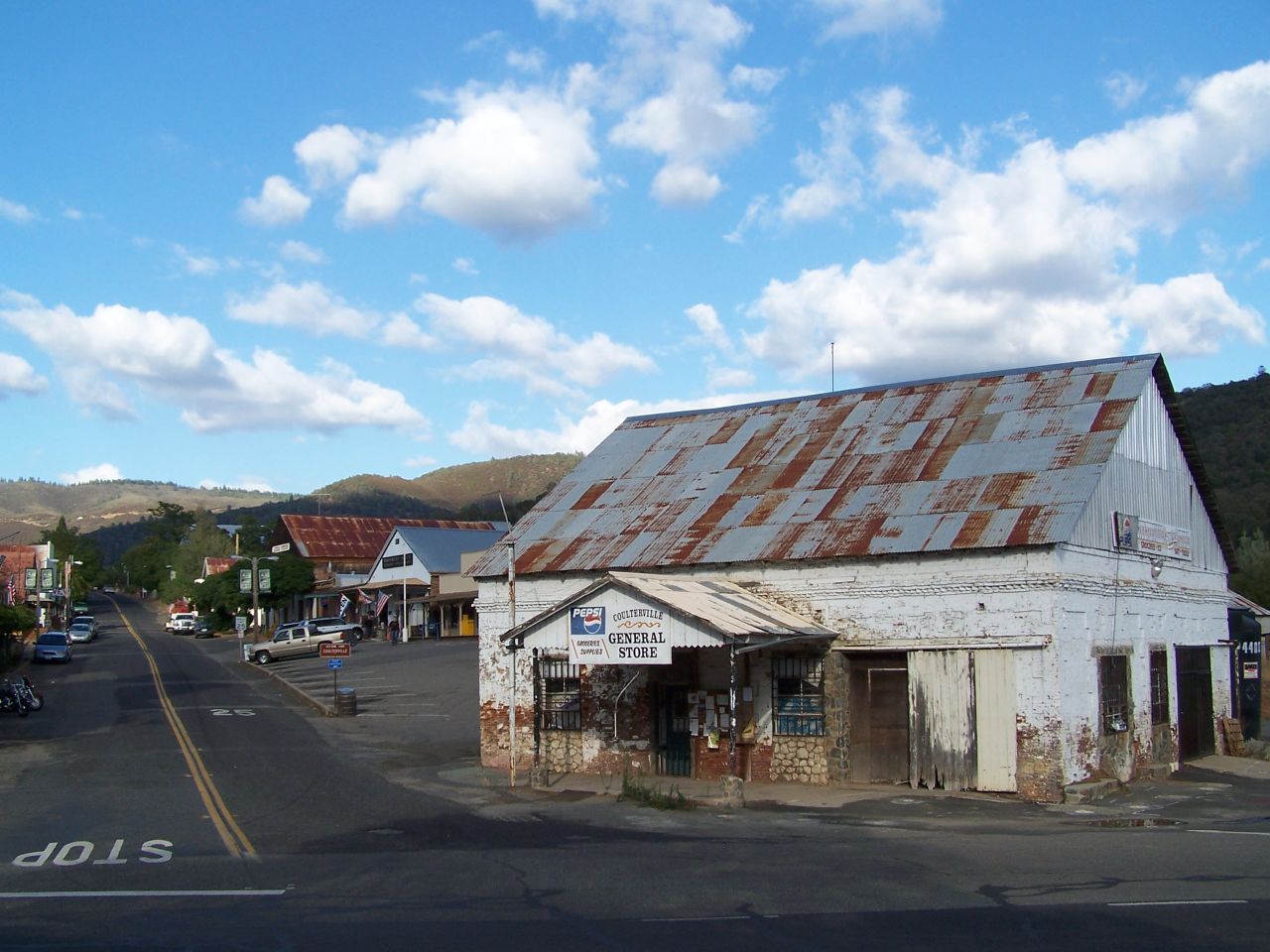 The exterior of a general store at the corner of a main road in Coulterville, California.