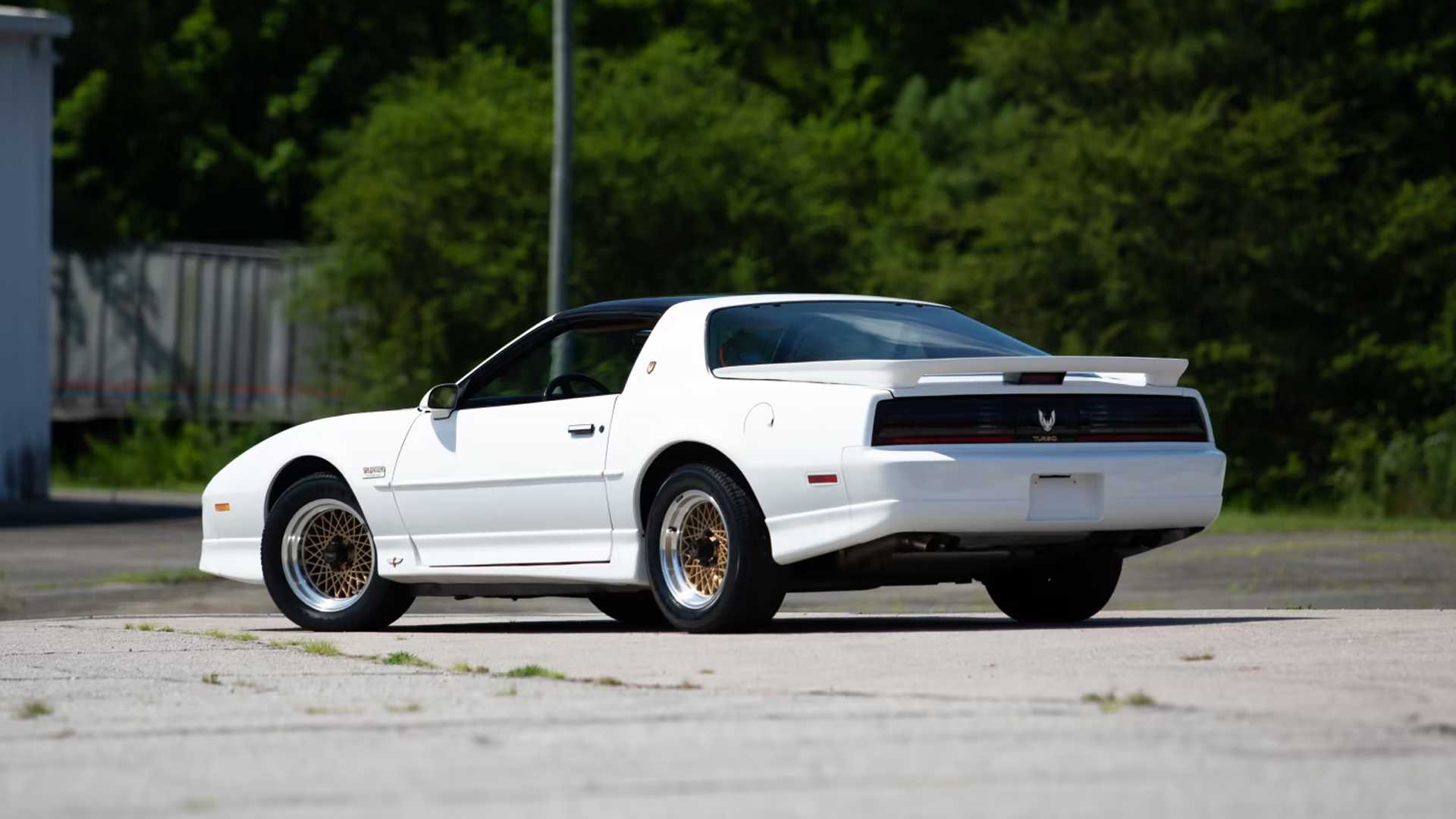 white 1989 Pontiac Turbo Trans Am 20th Anniversary parked