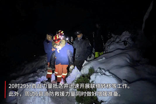 Firefighters in Tingri rescue trekkers from Everest after they were stranded by a blizzard (Tibet Firefighting Department)