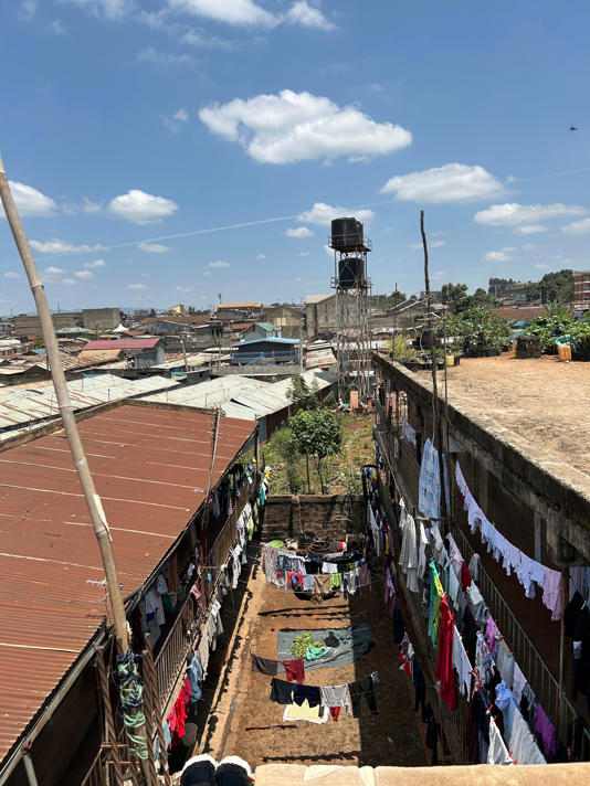 The vast number of colourful garments on display on laundry day give an indication of just how many people live in Jane’s block (Nick Ferris)