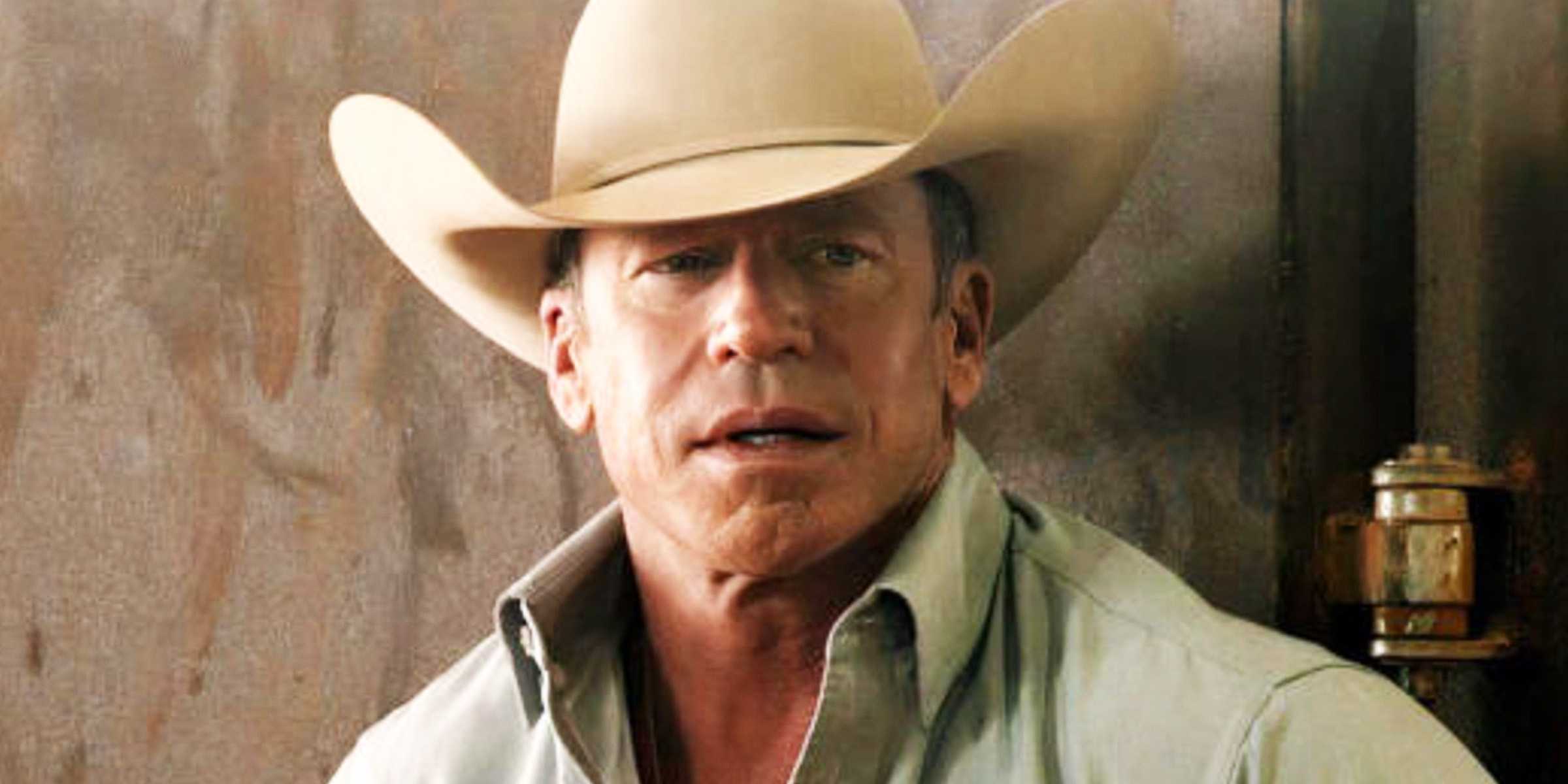 Taylor Sheridan in Yellowstone in hat and shirt looking confused