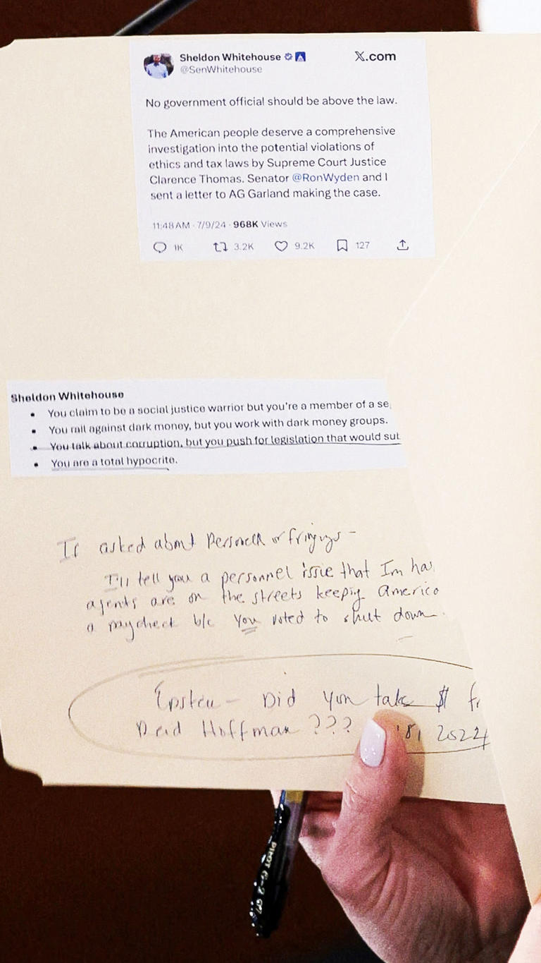 Bondi had notes on how she would attack Senator Whitehouse instead of answering his questions. / Getty Images