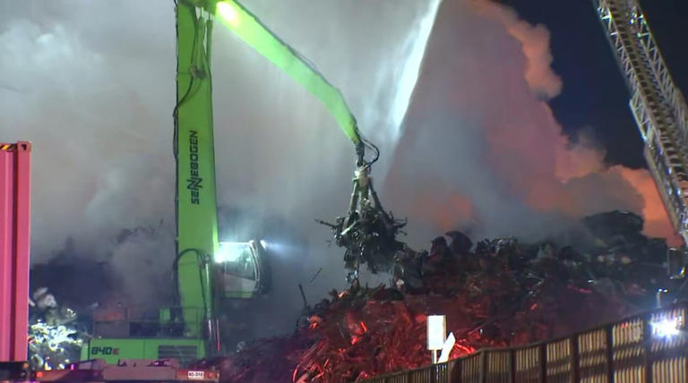 Firefighters battle massive fire at metal recycling plant in Vancouver
