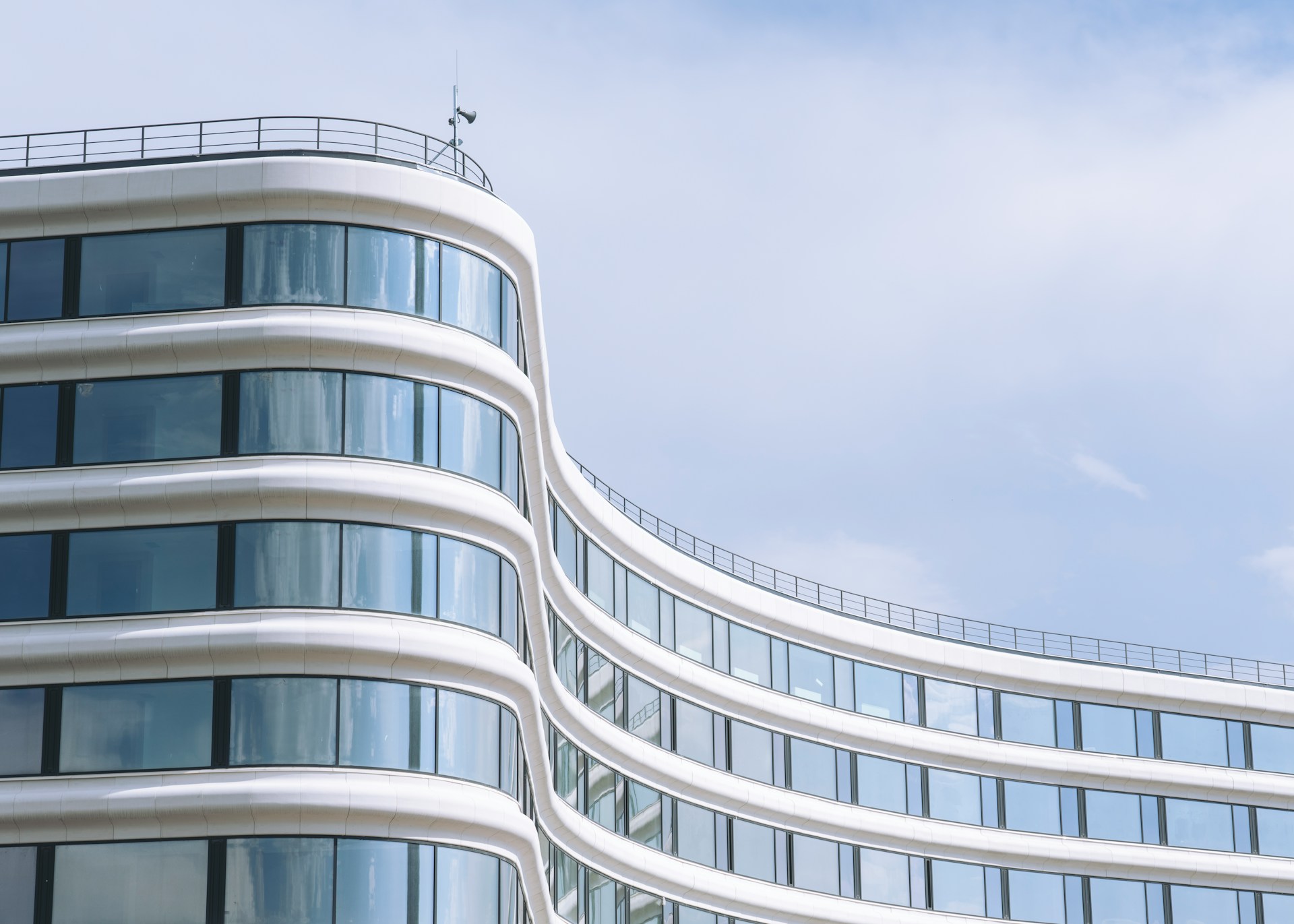 From Views to Value: Boosting Property Worth with Curved Glass ...