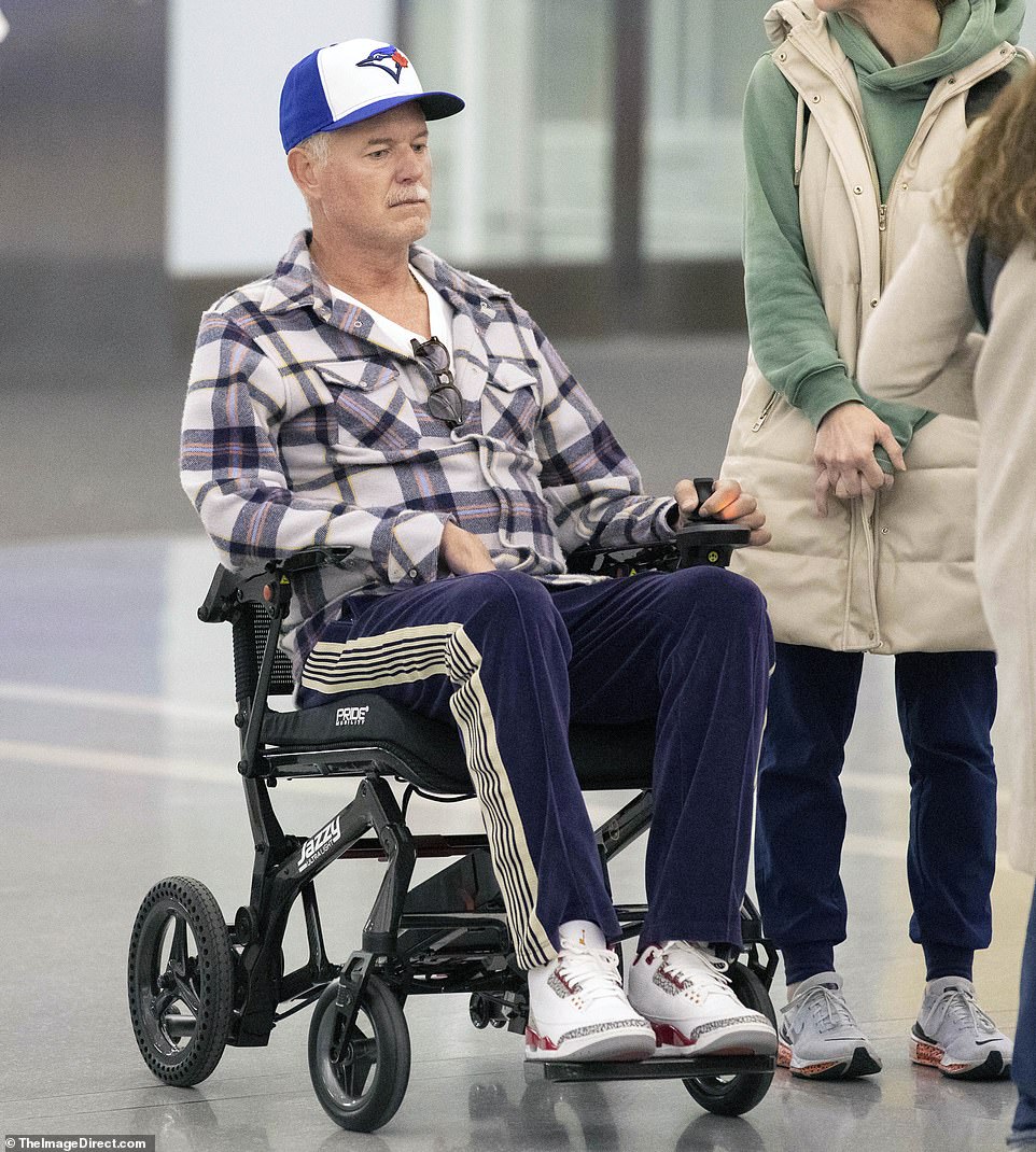 Eric Dane's ALS decline laid bare as he struggles into wheelchair