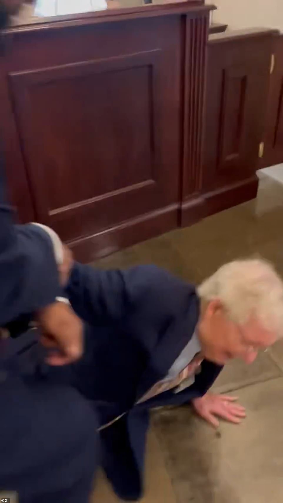 Mitch McConnell falls inside Senate office building