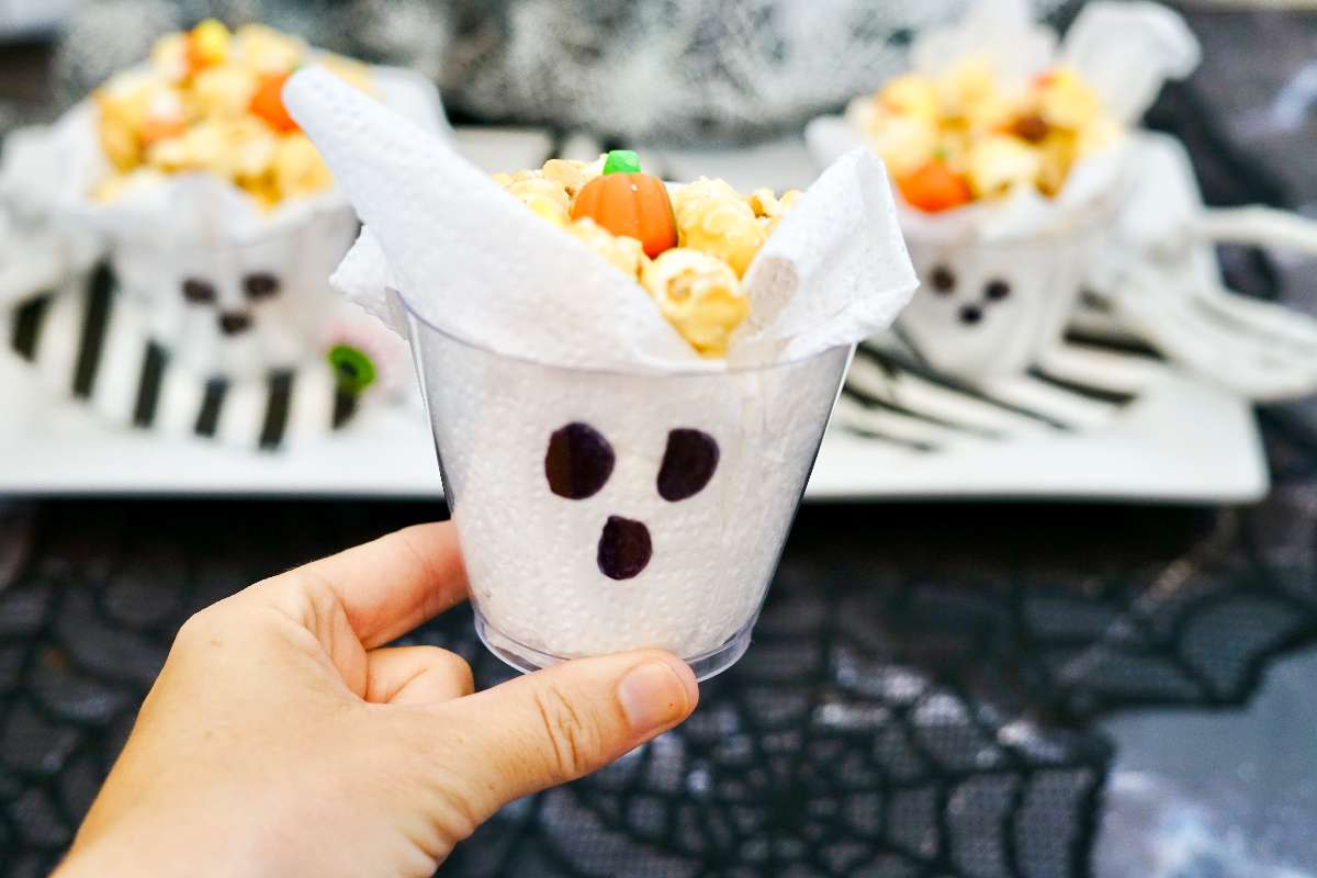 Serve up sweets in these Halloween snack mix boo cups