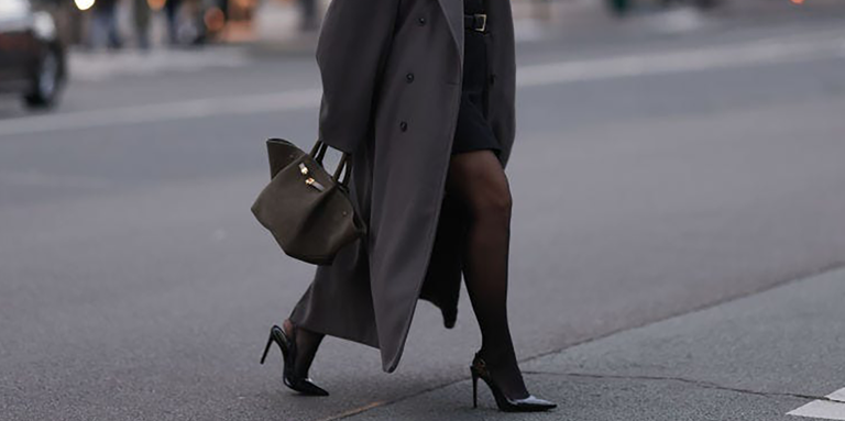 13 stylish ways to wear black tights with a dress for any occasion