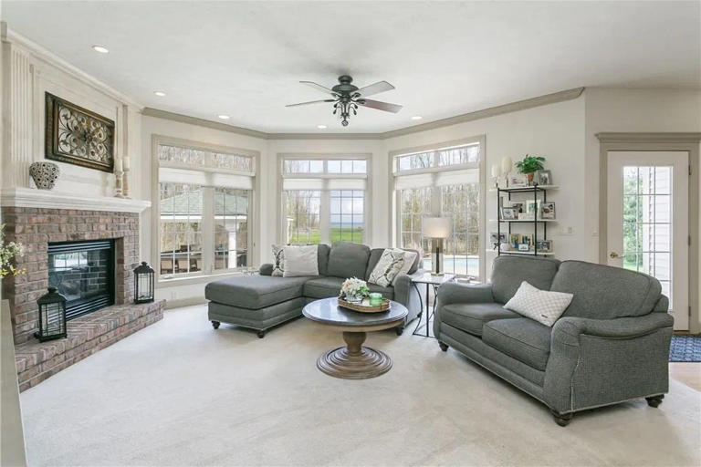 Massive lakefront mansion with private beach, pool for sale in upstate ...