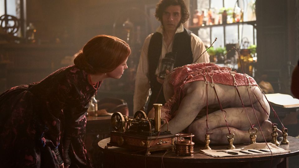 Mia Goth as Elizabeth and Oscar Issac as Victor Frankenstein in "Frankenstein." - Ken Woroner/Netflix