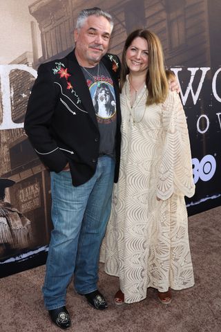 W. Earl Brown and Carrie Paschall attend the premiere of