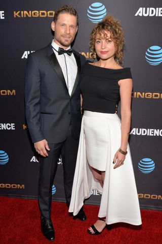 Matt Lauria and Michelle Armstrong attend the premiere for