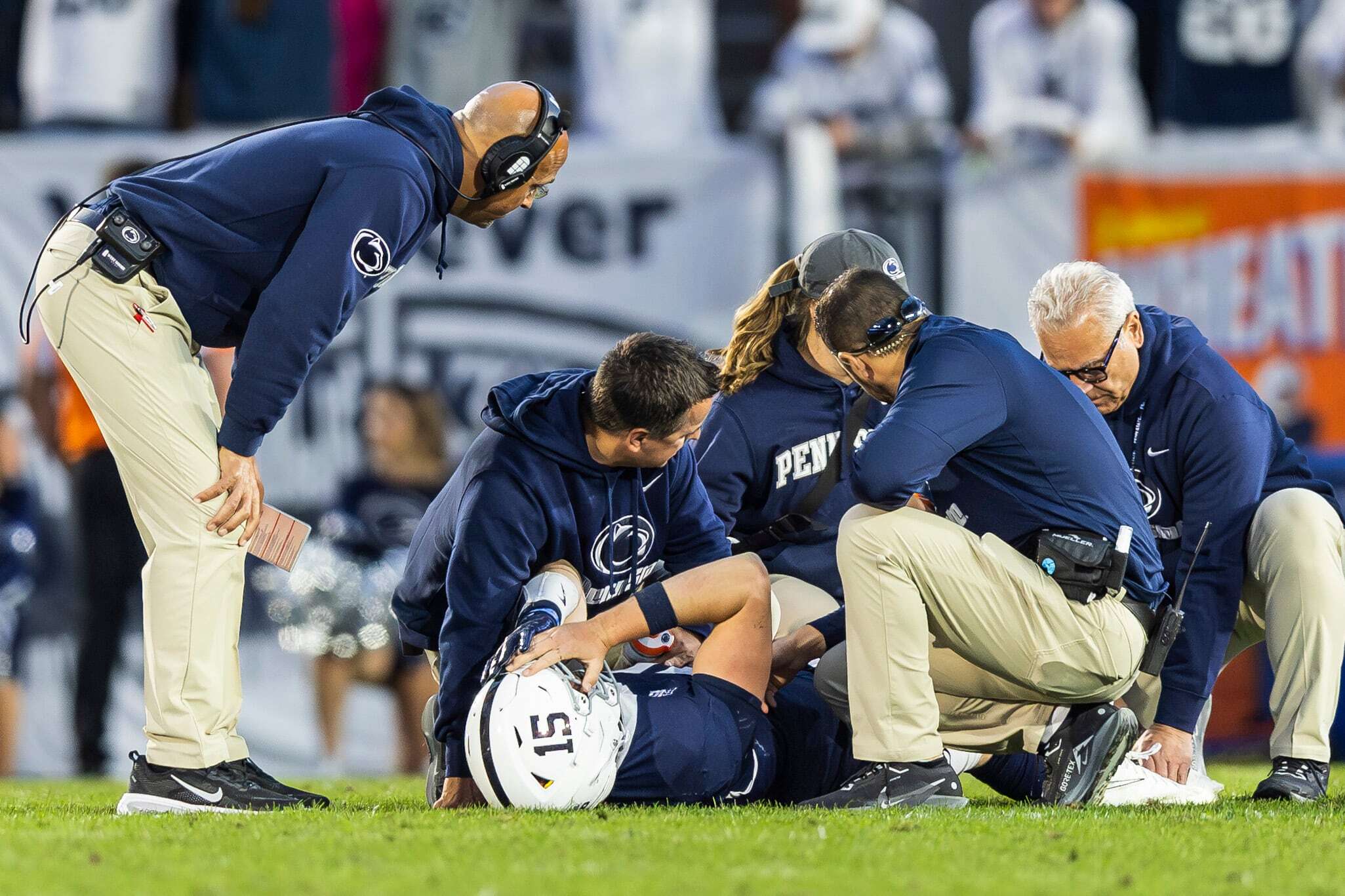 Penn State quarterback Drew Allar is tended to after getting injured on a play during the fourth quarter. James Franklin looks on as trainer Andy Mutnan and team physician Dr. Wayne Sebastianelli tend to Allar. Oct. 11, 2025. Joe Hermitt | jhermitt@pennlive.com Joe Hermitt | jhermitt@pennlive.com