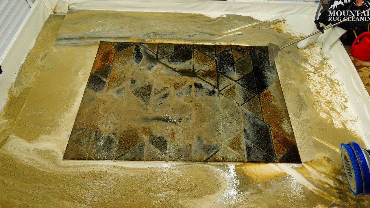 Shocking rug restoration! Watch this filthy, bog-like rug get a ...