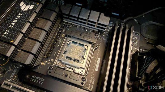A photo of a CPU with old thermal paste on it