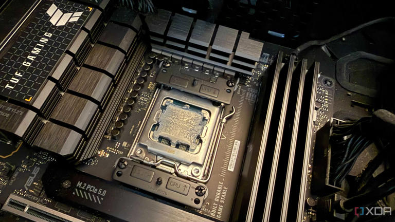 A photo of a CPU with old thermal paste on it