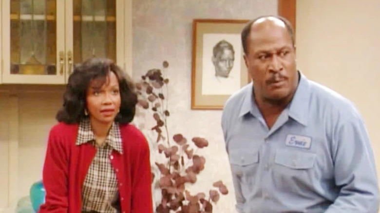 Rose Cumberbatch and Ernie Cumberbatch stand in a kitchen in 704 Hauser